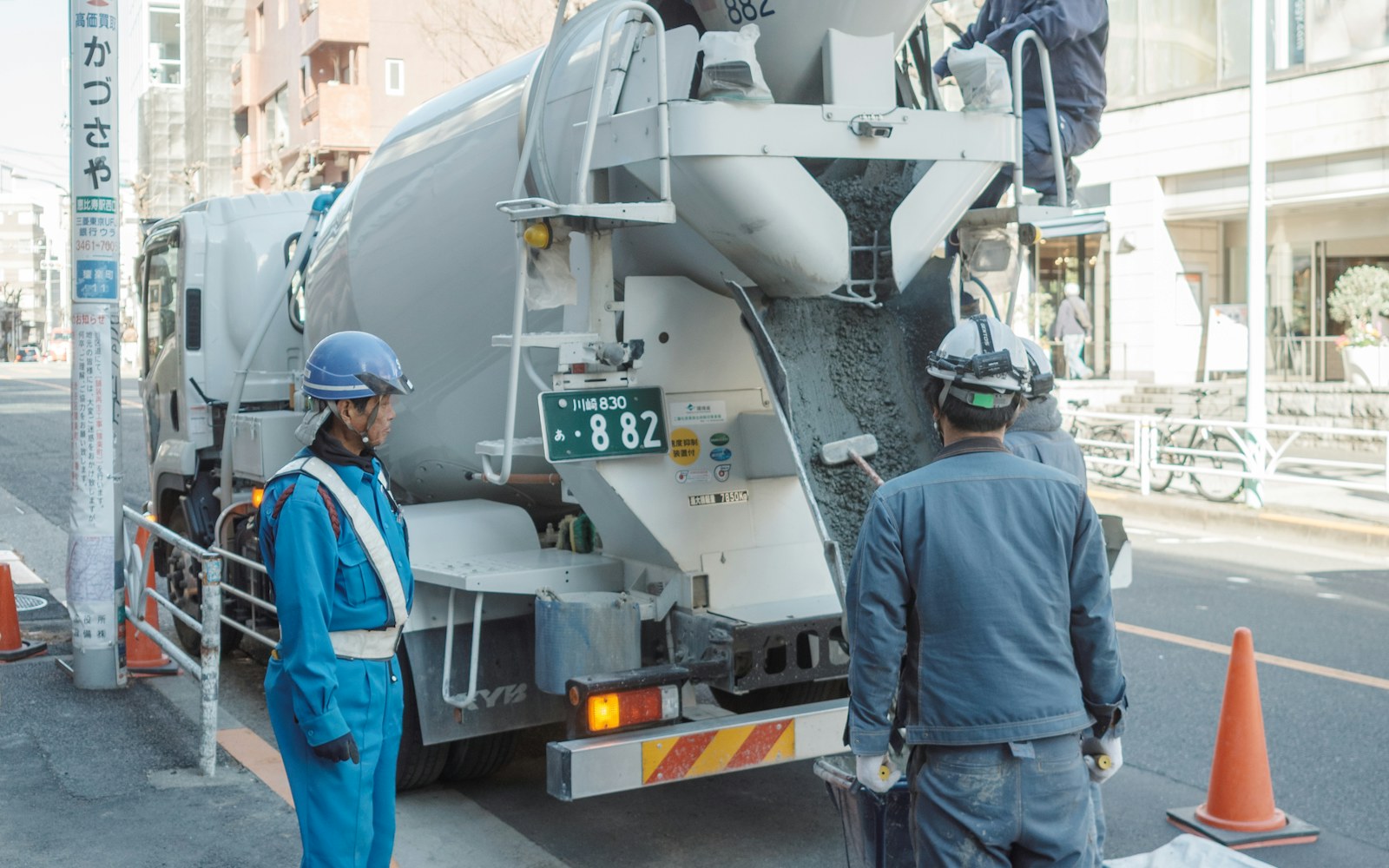 Cement mixer truck on site during concrete placement